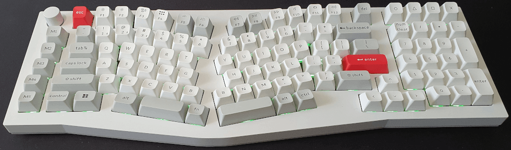 The Keychron q13 Pro, white edition. Featuring white keys and a red escape and enter key.