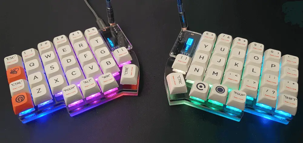 An image of the fully assembled Lyl58 keyboard, showing a white set of keycaps and multi-coloured LED lights..