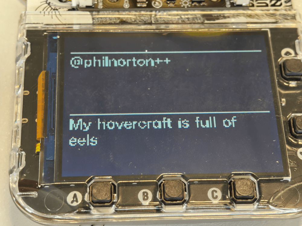 The Tufty2350 badge, showing a stream of messages. The messages are philinorton++ and my hovercraft if full of eels.