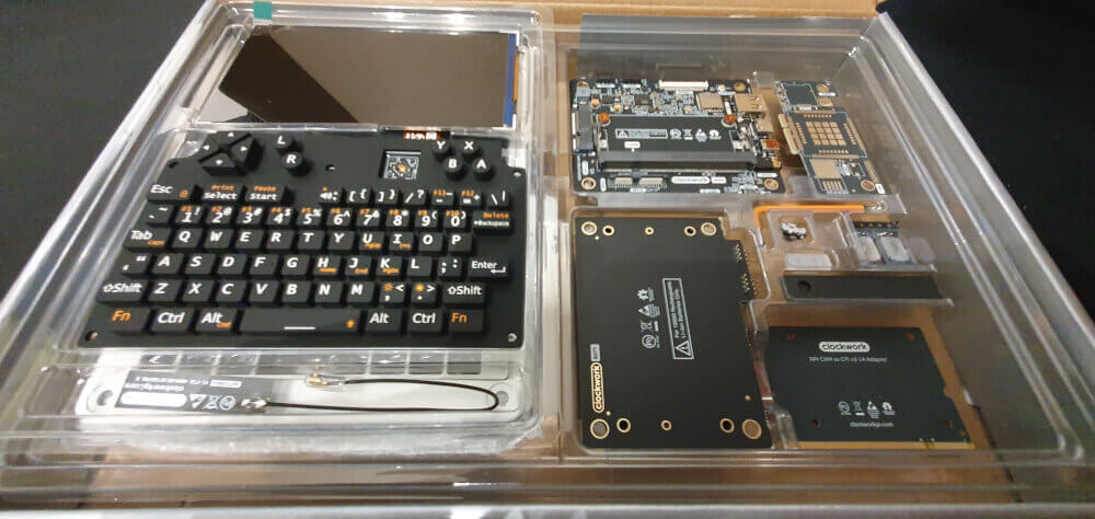 The uConsole in the package, showing the system boards of the device.