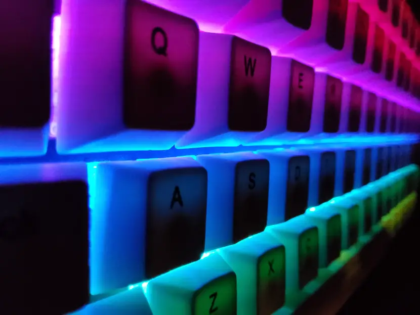 Vissles V84 mechanical keyboard, showing the RBG lights in a dark room.